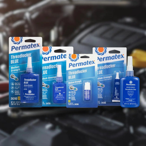 Front view of Permatex Threadlocker Blue bottles and display cards; medium-strength, 6 ml size; multiple boxes visible.