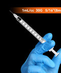 Bulk 30 Pack U100 Syringes 30 Gauge Five Sixteenth Inch 8 Millimeter 1 mL Disposable, Individually Wrapped, Pro Grade Performance, Smooth Leak-Proof Plunger, Clear Barrel, Medical Grade Single-Use Syringes. Clear 1 mL U-100 syringe held in gloved hand