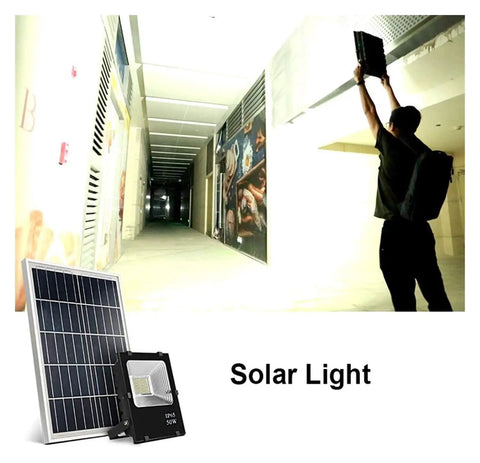JUDYSSY Courtyard Light Led Solar Flood Light Outdoor, Ip66 Waterproof Dusk to Dawn Solar Security Light with Remote, a person holds solar light.