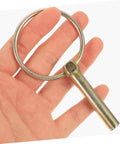 12 Piece Beefed Up Tractor Trailer Hitch Pins Kit With Heavy Duty Retaining Pins And Rings, zinc-coated pin held in hand