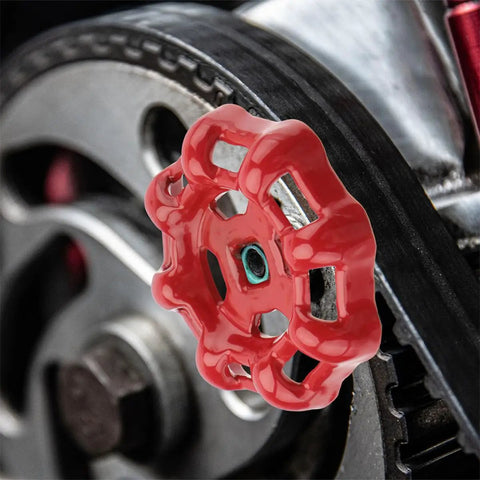 Close-up of red cast iron 7x7mm gate valve shutoff handle for industrial valve control, showing flat bottom design on metal ball hand wheel.
