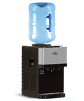 Limited Edition Top Loading Countertop Water Cooler Dispenser With On Demand Hot Cold And Room Temperature Water Tri Temp UL And Energy Star Approved Stainless Steel Reservoirs Kid Safe Lock on kitchen counter