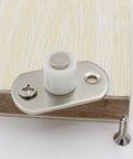 Sliding Barn Door Nylon Guide Wheel Set 4 Pieces With Floor Guide Roller Bracket installed on wooden surface with screws
