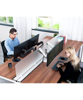 Slick Dual Monitor Mount Arm Fits 17 To 32 Inch Screens And Full Motion Gas Strut Stand used in a modern office setup.