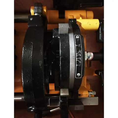 Close-up of Job Site Ready Electric Pipe Threader Machine With 220V 750W Motor showing size gauge for 1/2 to 2 inch NPT dies.