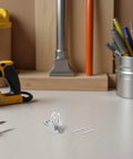 Precision Mini Vise Aluminum Alloy Workholding Tool With Stable Nonmarring Grip positioned on a workbench for crafts and repairs.