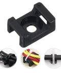 120 Pcs Heavy Duty Nylon Cable Tie Mounts Black Screw Fix Wire Organizers For Home And Office Keep Your Setup Tough As Nails With Rock Solid Clips That Make Taming Wires A Sweet And Simple Deal - close-up view of black nylon cable tie mount for wire organization.