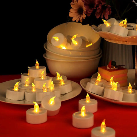 12 Pack Flameless Tea Lights LED Candles With Realistic Flicker And Cozy Warm Yellow Glow For Halloween Decor display on table