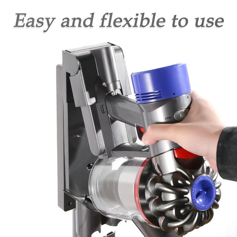 Person placing a V7 V8 Compatible Docking Station Replacement Part For Cordless Handheld Vacuum Cleaners onto wall-mounted dock.