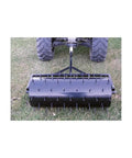 36 Inch Wide Lawn Aerator Roller With 78 Steel Spikes And 24 Gallon Water Holder For Behind Mower Or ATV Use, attached to ATV.