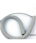 Slick 4-Core Coiled Power Cord With Rad Spiral Design Offering Seamless Electrical Connections And No Tangles Featuring Durable Polyurethane Jacket.