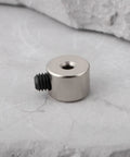 Close-up of a metal clamping collar with grub screw, part of 20pcs 1.5mm Quick Release Locating Rings, 7mm OD, silver finish.