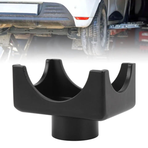 Bottle Jack Axle Adapter Lifting Saddle for 12 Ton Jacks with black powder coat under a lifted vehicle.