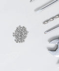 Premium Stainless Steel Dowel Pins Kit For Heavy Duty Shelf Support Brackets Smooth Cylinder Pegs on a work table with tools.