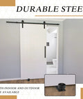 4 Pieces Sliding Closet Barn Door Floor Guide Kit with flush wall mount and bottom adjustable roller installed on door.