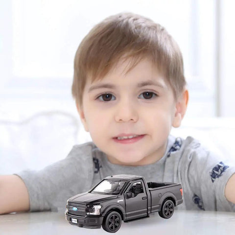 Child playing with Licensed F150 One Thirty Six Scale Zinc Alloy Die Cast Pickup Truck Toy For Kids Toddlers