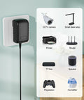 Rock Solid 6V AC Adapter No Sweat Plug And Play Charger powering various devices like printer and speaker in home setting.