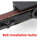 Close-up of the belt installation button on Mini Pneumatic Belt Grinder Sander Tool With Grit Belts For Polishing Metal.