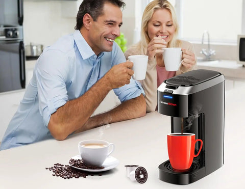 Single Serve K Cup Pod Coffee Maker With Six To Fourteen Oz Brew Size One Touch Fast Three Minute Brew Strength Control BPA Free Materials Fits Six Point Six Inch Travel Mugs Silver Upgrade shown on kitchen counter with couple enjoying coffee.