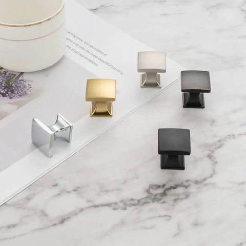 Curved Square Top Cabinet Knob Chrome Pull Handle 25mm Pack Of 25 in various colors displayed on marble surface