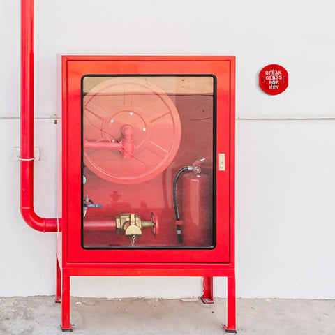 Red emergency key box with break glass for quick entry, featuring wall-mounted design for home or office door key storage.