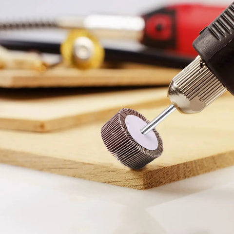 10Pcs Polishing Wheels For Rotary Tools With Brown Corundum Abrasive And Cloth Substrate in use on wooden surface