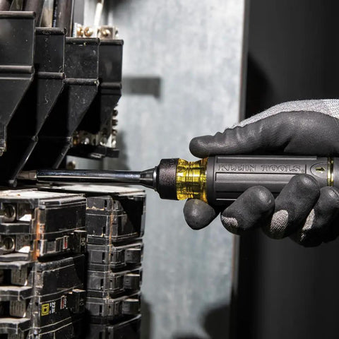 Ratcheting Multi-Bit Screwdriver 15-In-1 with Phillips Slotted Square Torx and Combo Bits in hand during electrical work