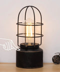 Industrial Table Lamp With Touch Control And 3 Way Dimming, lit vintage iron cage desk light on a nightstand