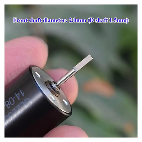 Close-up of Mini Coreless DC Motor 22mm By 33mm with dual shaft, showing NdFeB magnets and 5 pole rotor for RC drones and robots.