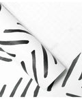 Boho Peel And Stick Chevron Wallpaper Self Adhesive Mural In Black And White Stripes 17.7In By 32.8Ft showing peel detail