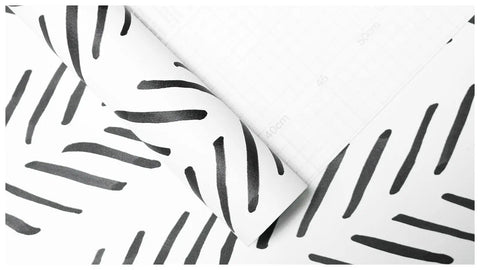 Boho Peel And Stick Chevron Wallpaper Self Adhesive Mural In Black And White Stripes 17.7In By 32.8Ft showing peel detail