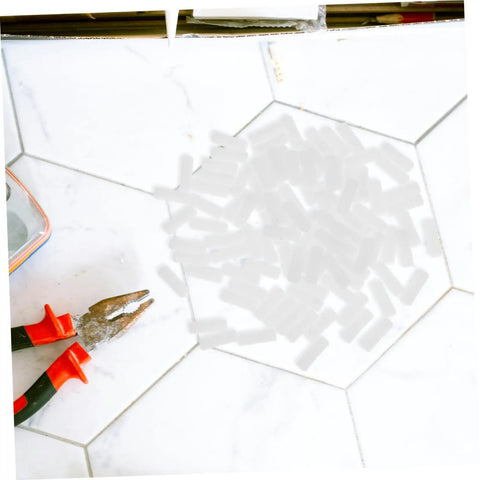 Hella Sturdy Slick Furniture Connector Kit 100 Piece Hidden Fasteners on work surface with pliers and connectors.