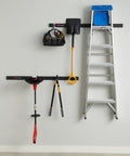 FastTrack Garage Storage Rail System 7 Piece Hook Kit Heavy Duty Tool Organizer with tools and ladder on gray wall