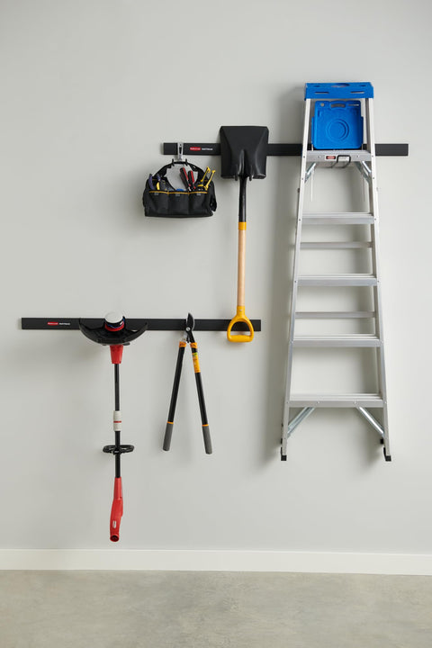FastTrack Garage Storage Rail System 7 Piece Hook Kit Heavy Duty Tool Organizer with tools and ladder on gray wall