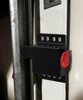 Close-up of Heavy Duty Built Tough Matte Black Garage Door Lock Kit With Inside Deadbolt Security Side Lock installed on garage door
