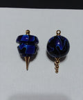 Two polished blue lathe-turned ornaments demonstrating One Step Plastic Polish For Lathe Turning All In One Buff effectiveness