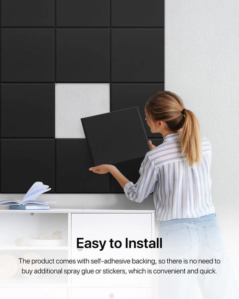 Person installing Self-Adhesive Soundproof Wall Panels 18 Pack Square Acoustic Foam Panels For Walls Home Office And Recording Studio Pro Grade High Density Noise Reduction 12 X 12 X 0.4 Inches Black on wall, easy installation