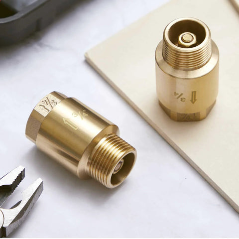 Side view of two brass 3/4 in inline check valves with male FNPT ends