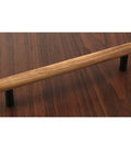 Walnut Solid Wood Pull Handles With Black Aluminum Base For Cabinets And Drawers, 160mm Hole Center, side view on wood surface