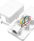 Top Shelf Surface Mount Single Port RJ11 Phone Jack With Four Screw Terminals For Smooth Landline Fax Hookup Hassle Free Install Works Flawlessly On Any Standard White Wall Plate, showing connections and screw terminals.