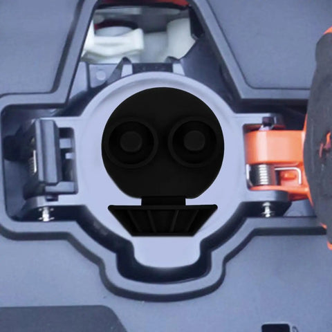 Universal Silicone EV Charging Port Covers two pair, black silicone caps fitting snugly in an EV charge socket.