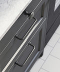 Close-up of 12.6-Inch Center To Center Weathered Nickel Cabinet Handles 6 Pack Old School Antique Iron Bar Pulls on dark cabinet