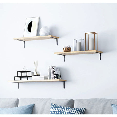 Top Tier Heavy Duty L Shaped Corner Brackets For Shelving Set Of 2 Black Metal Wall Mounts supporting stylish floating shelves.