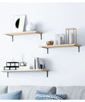 Rock Solid Steel Corner Brackets 1 Pair Heavy Duty Wall Mounted Floating Shelf Hardware Effortless Install Metal Support Arms For Diy Open Shelves And Sweet Home Setup 10 Inch, featuring three wood shelves with metal brackets.