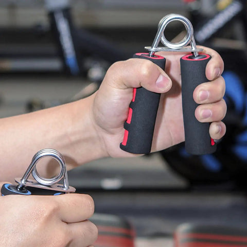Hand Grip Strengthener Two Pack With Soft Foam Handles for wrist forearm and finger workout, close-up in use