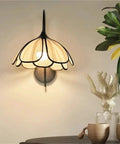 Nordic Floral Petal Wall Sconce Fabric Shade Wall Light,Warmth with floral shade in a cozy living space.