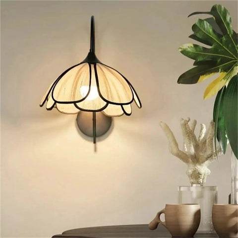 Nordic Floral Petal Wall Sconce Fabric Shade Wall Light,Warmth with floral shade in a cozy living space.