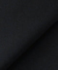 Pro Grade Black Acoustical Fabric Precut Sheets Heavy Duty Sound Dampening Textile close-up showing smooth black texture.