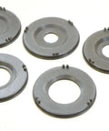 Precision Router Table Insert Ring Set With Straight Up Tough Build Quality For Three Inch Outer Diameter Flush Fit And Lightning Quick Swap Setup On Classic Router Tables - five black rings arranged.