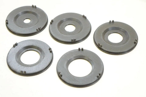 Precision Router Table Insert Ring Set With Straight Up Tough Build Quality For Three Inch Outer Diameter Flush Fit And Lightning Quick Swap Setup On Classic Router Tables - five black rings arranged.